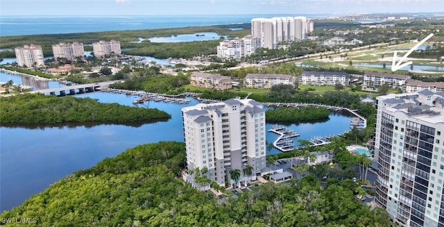 aerial view featuring a water view and a view of city