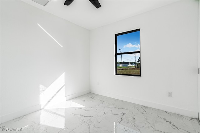 empty room featuring ceiling fan