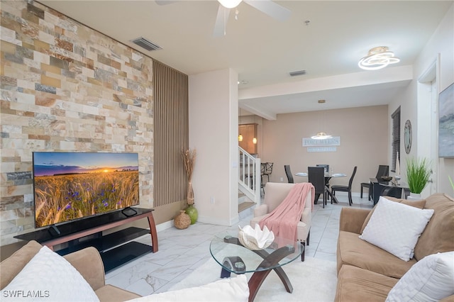 living room with ceiling fan