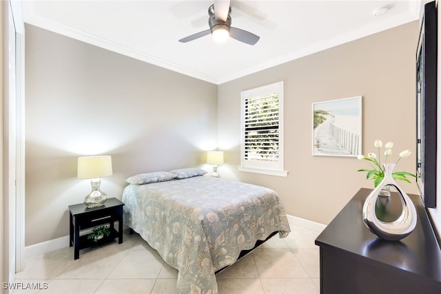 bedroom featuring ceiling fan, light tile patterned floors, and crown molding