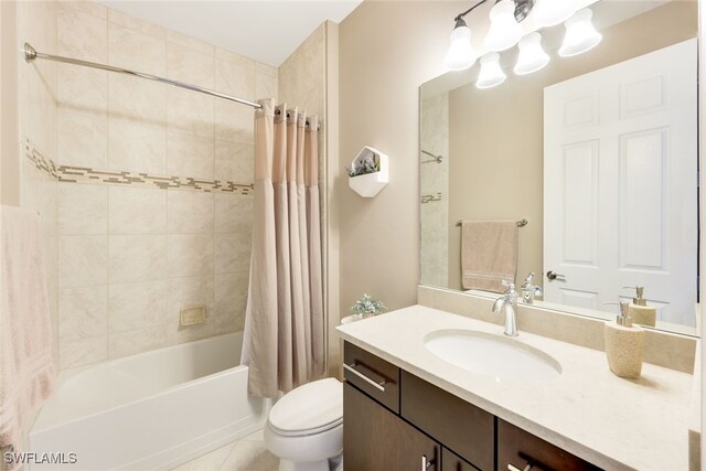 full bathroom featuring tile patterned flooring, vanity, shower / bath combination with curtain, and toilet