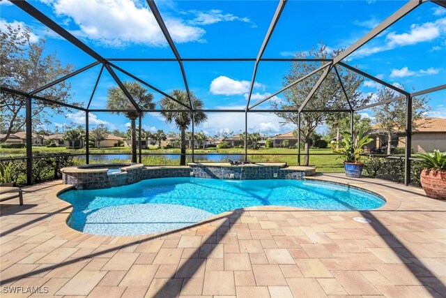 view of pool featuring a lanai, an in ground hot tub, pool water feature, and a patio