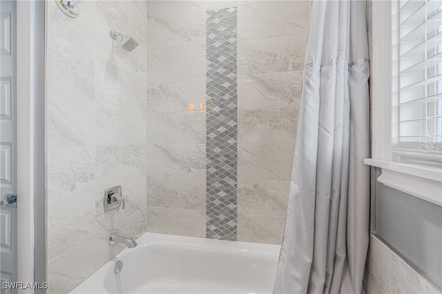 bathroom featuring shower / tub combo