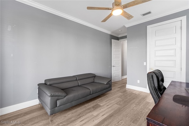 office area featuring hardwood / wood-style flooring, ceiling fan, and ornamental molding