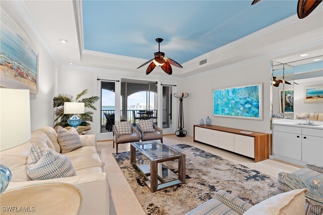2000 Royal Marco Way Unit 2-407, Marco Island, FL 34145 - living room with a ceiling fan, a tray ceiling, light tile patterned floors, ornamental molding, and recessed lighting