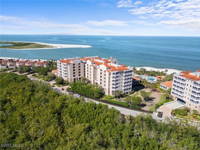 bird's eye view with a beach view and a water view