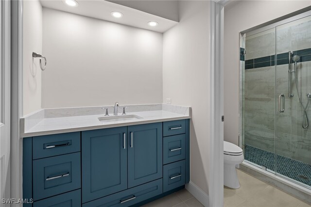 2000 Royal Marco Way Unit 2-407, Marco Island, FL 34145 - bathroom with toilet, a stall shower, vanity, tile patterned floors, and recessed lighting