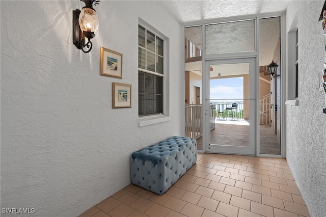 entryway featuring tile patterned flooring