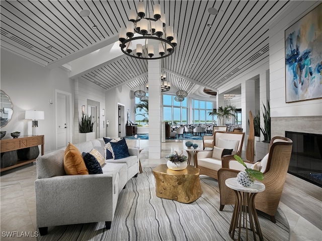 interior space with wooden ceiling, lofted ceiling, and an inviting chandelier