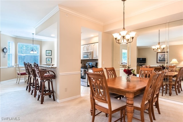 dining space with a notable chandelier, ornamental molding, and light carpet