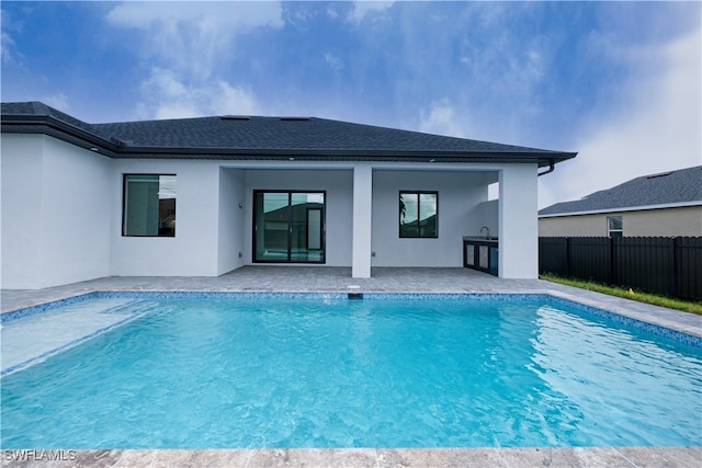 view of pool featuring a patio