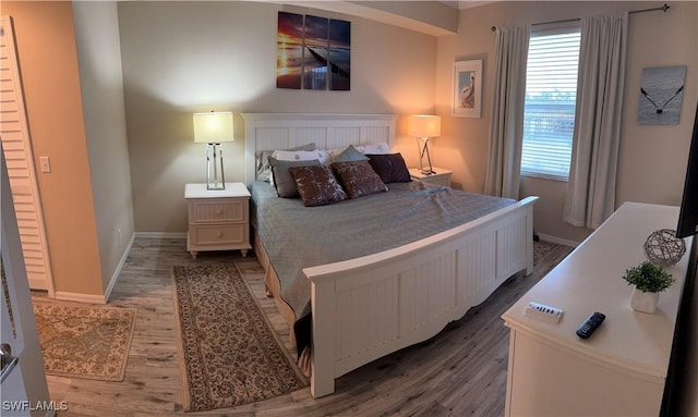 bedroom featuring hardwood / wood-style flooring