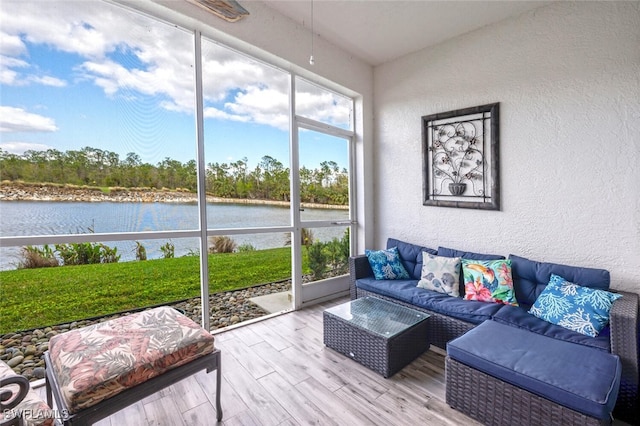 sunroom with a water view