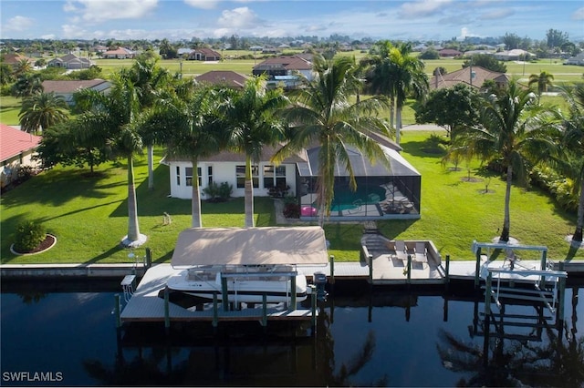 view of dock with a lanai