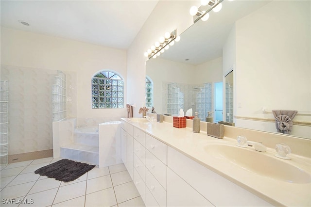 bathroom with tile patterned flooring, vanity, separate shower and tub, and vaulted ceiling