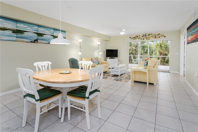 dining room featuring ceiling fan and light tile patterned floors