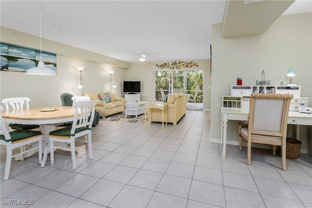 dining area featuring light tile patterned flooring