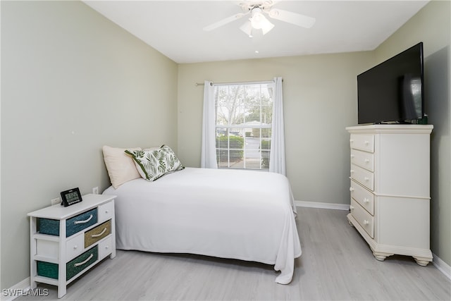 bedroom featuring ceiling fan and light hardwood / wood-style flooring