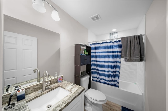 full bathroom with shower / bath combination with curtain, vanity, wood-type flooring, and toilet