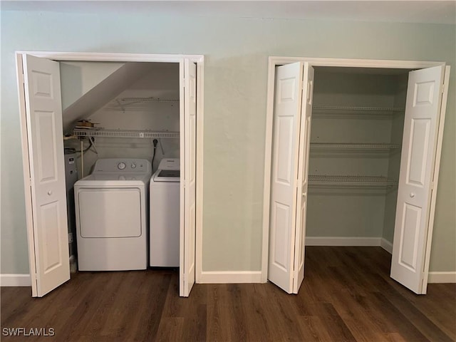 washroom with independent washer and dryer and dark wood-type flooring