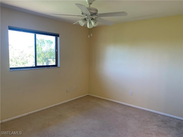 13508 Siesta Pines Ct Unit 8, Fort Myers, FL 33908 - carpeted empty room with ceiling fan and baseboards