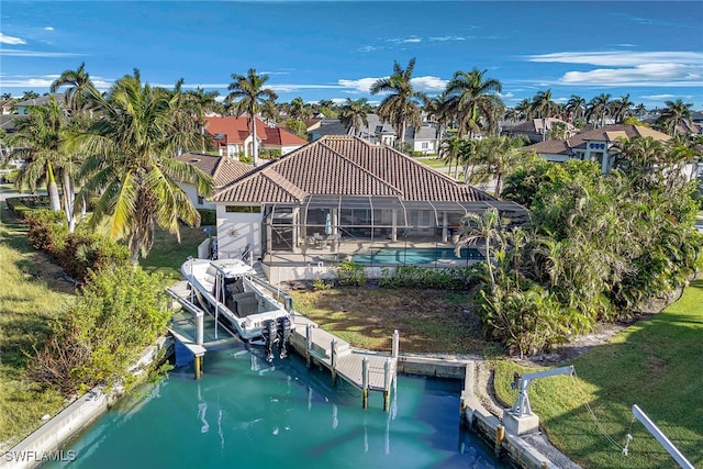 drone / aerial view with a water view