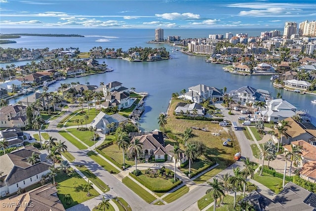 bird's eye view featuring a residential view, a water view, and a city view