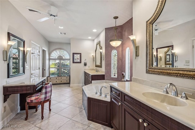 full bathroom featuring two vanities, visible vents, a sink, and a ceiling fan