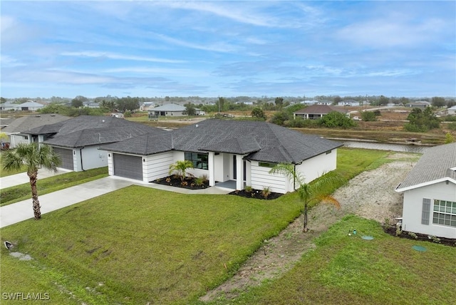 ranch-style house with a garage and a front yard