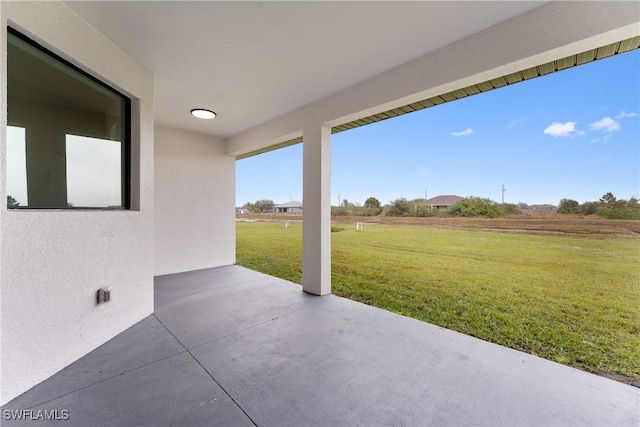 view of patio with a rural view