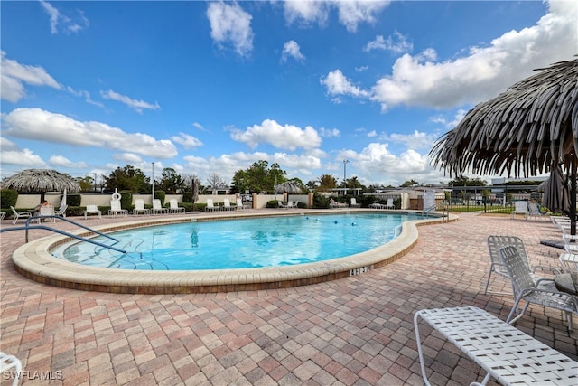 view of pool featuring a patio area