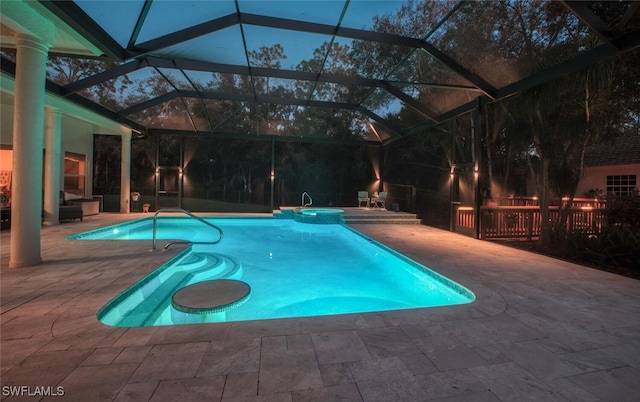 view of swimming pool with a pool with connected hot tub and a patio