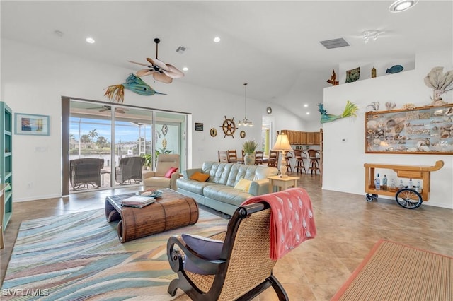 living room with a ceiling fan, recessed lighting, visible vents, and lofted ceiling