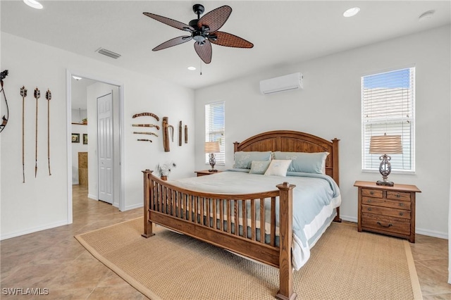 bedroom featuring recessed lighting, visible vents, baseboards, and a wall mounted AC