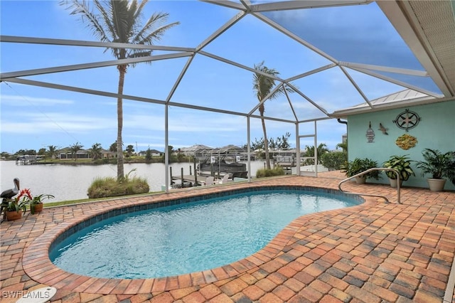 pool with a patio, boat lift, a water view, glass enclosure, and a boat dock