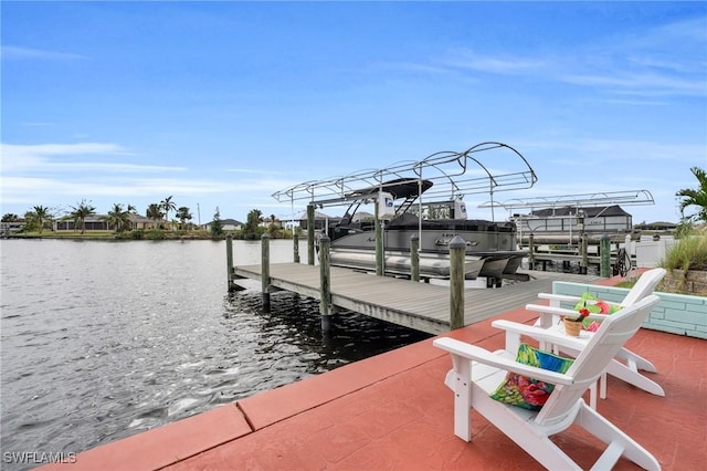 view of dock featuring a water view and boat lift