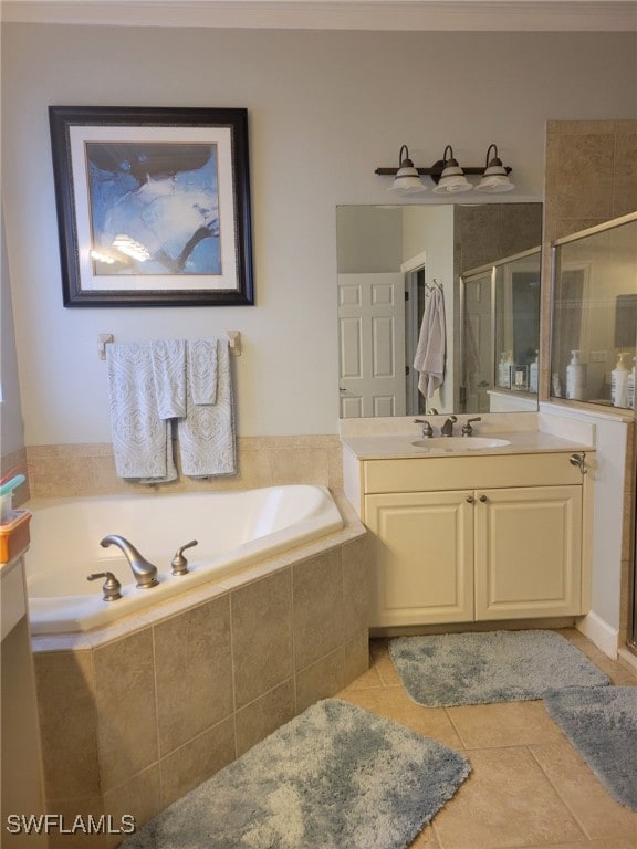 bathroom with tile patterned flooring, vanity, and plus walk in shower