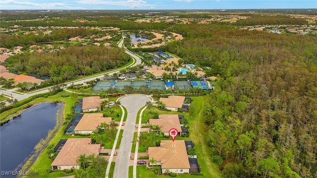 birds eye view of property featuring a water view