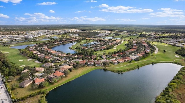 aerial view featuring a water view and a residential view