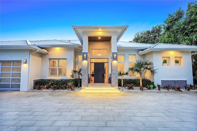 view of front of home featuring a garage