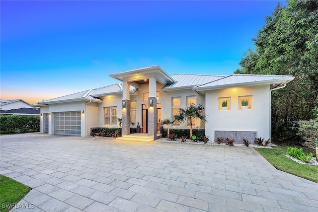 view of front of home featuring a garage