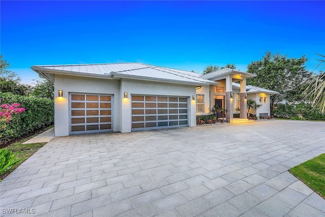 view of front of home with a garage