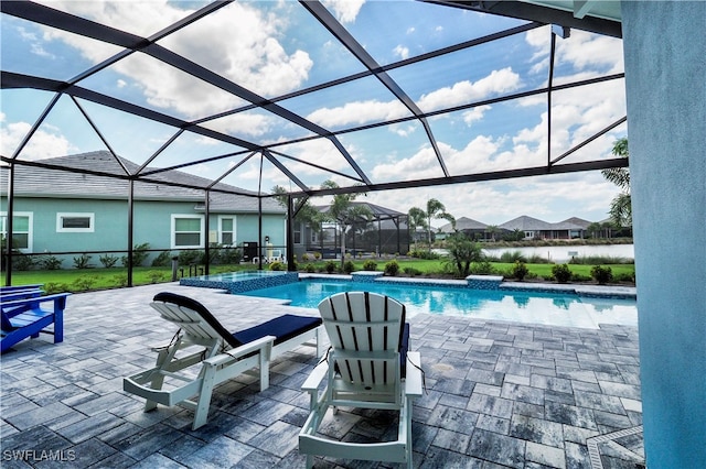 view of pool featuring a lanai and a patio area