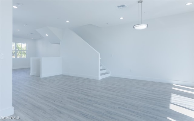 interior space with hardwood / wood-style floors