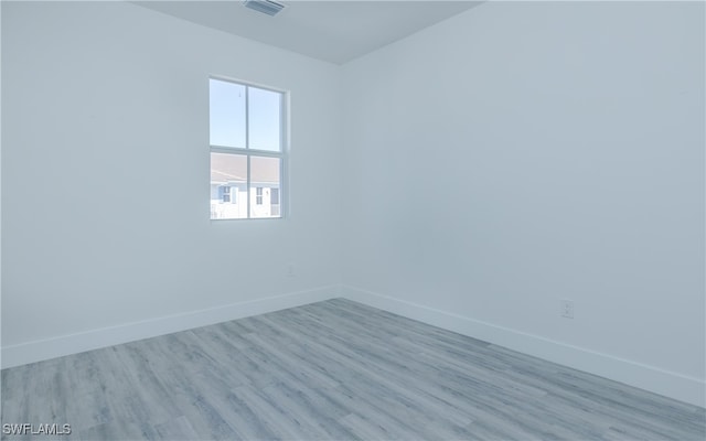 empty room featuring light hardwood / wood-style floors