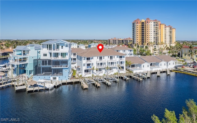 birds eye view of property featuring a water view