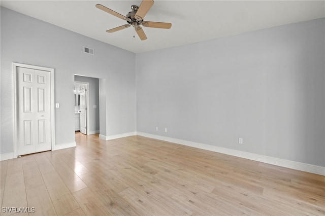 unfurnished room featuring ceiling fan and light wood-type flooring