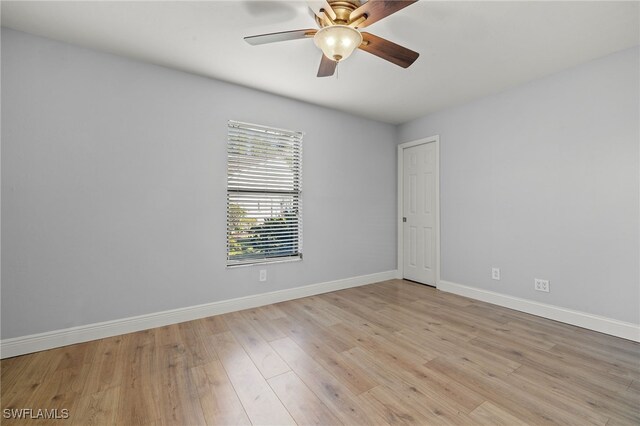 unfurnished room with light hardwood / wood-style floors