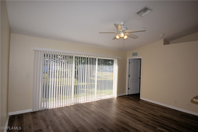 spare room featuring dark hardwood / wood-style floors, ceiling fan, and lofted ceiling