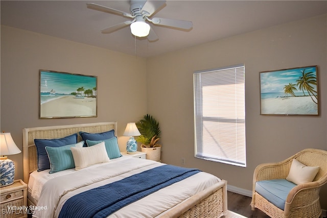 bedroom featuring hardwood / wood-style flooring and ceiling fan